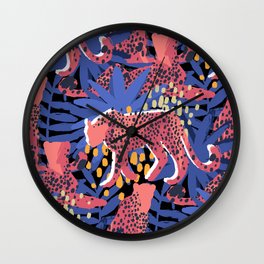 Vector graphic cheetah surrounded by exotic plants Wall Clock