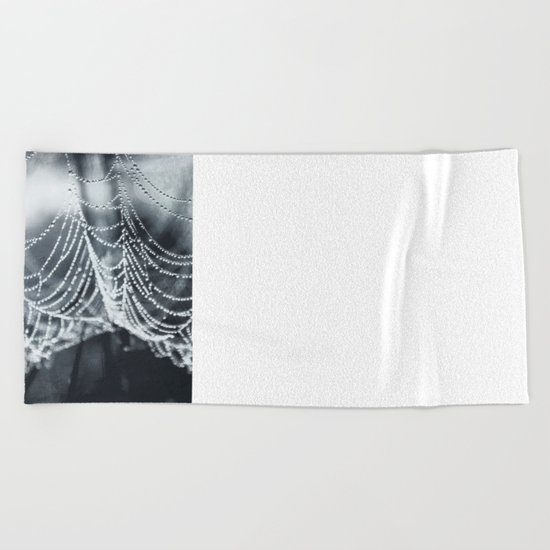 the weight of water Beach Towel