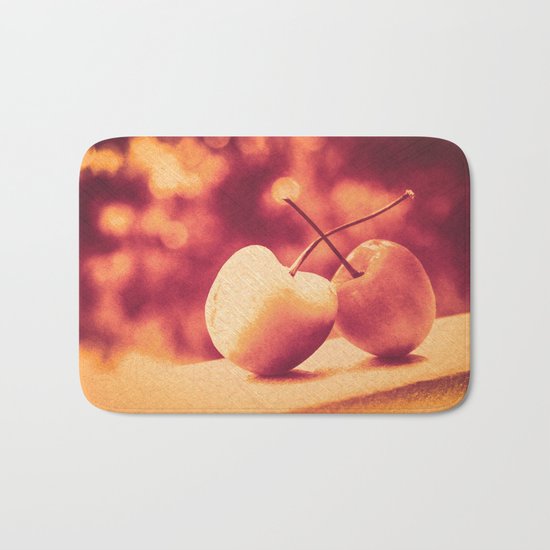 Sweet Moment (Rainier Cherries with Gold & Wine Red Bokeh Background) Bath Mat
