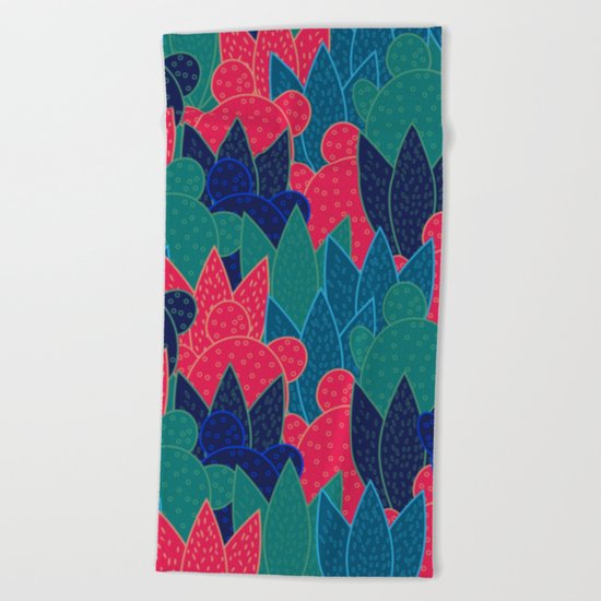 Cactus field at night Beach Towel