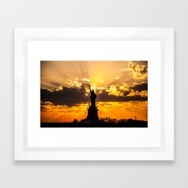 Statue of Liberty sunset in New York Harbor Framed Art Print