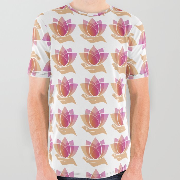Hand holding a pink lotus flower	 All Over Graphic Tee