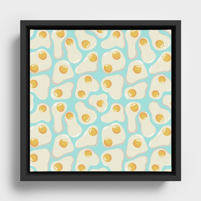 Fried Eggs on blue background Framed Canvas
