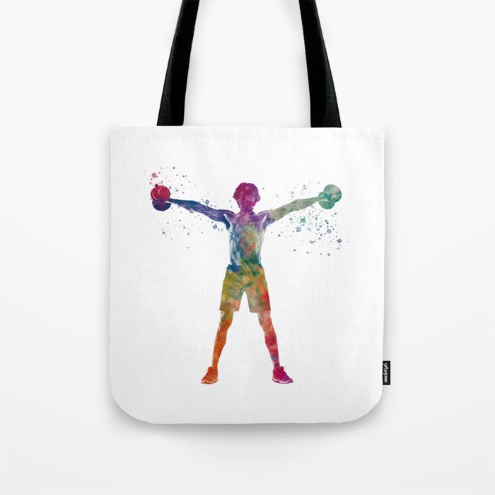 Young man exercising fitness in watercolor Tote Bag