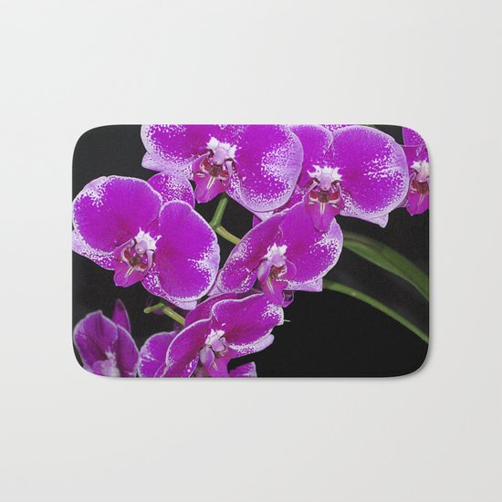 Graceful spray of deep pink orchids Bath Mat