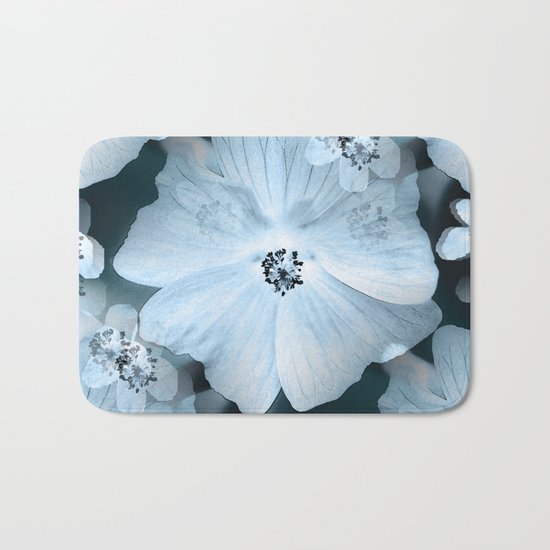 Flower-power - pastel blue flowers on a dark blue background Bath Mat