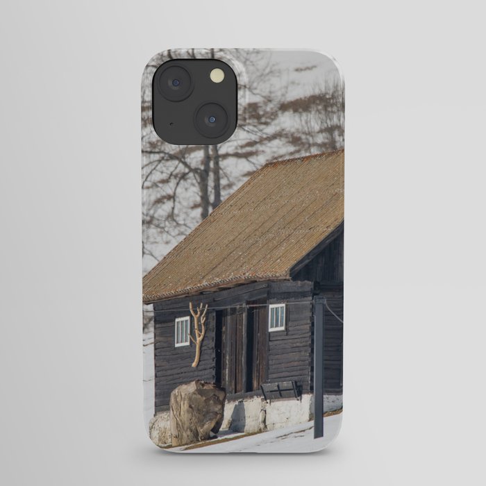 Old mountain house with Carpathian mountains in the background iPhone Case