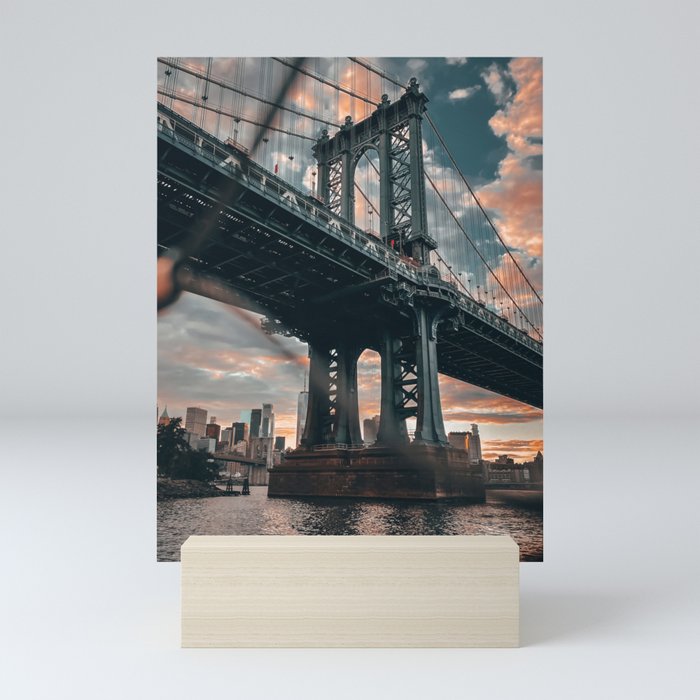 Manhattan Bridge and New York City skyline at sunset Mini Art Print