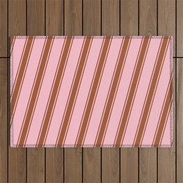 [ Thumbnail: Pink and Sienna Colored Pattern of Stripes Outdoor Rug ]