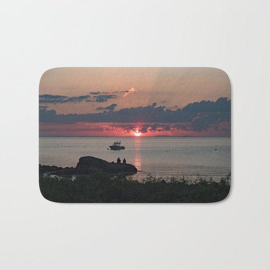 Sunset on the rocks Bath Mat