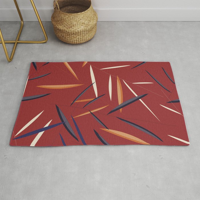 Leaves in a red background Rug