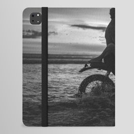 The motorcyclists; lovers at sunset on vintage motorcycle coastal beach romantic portrait black and white photograph - photography - photographs by Yuliya Kirayonak iPad Folio Case