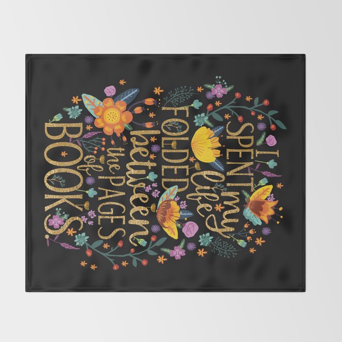 folded between the pages of books floral black throw folded between the pages of books floral black throw