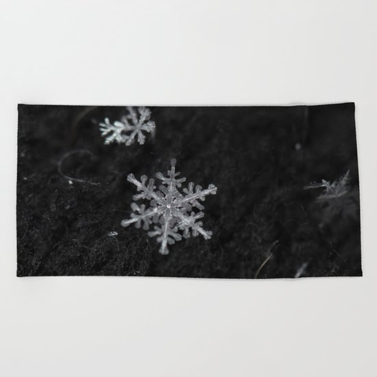 fragile snowflake Beach Towel