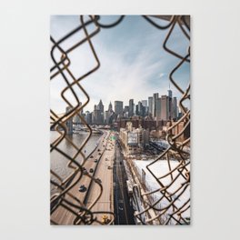 Views of New York City | Skyline and Brooklyn Bridge Through the Fence Canvas Print