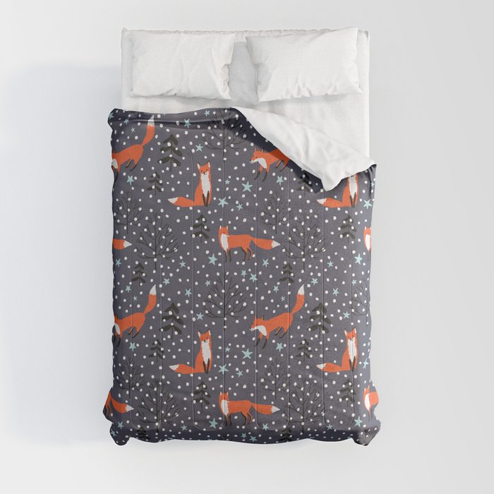 Red foxes in the nignt winter forest Comforter