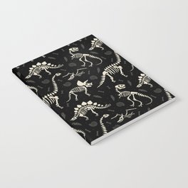 Dinosaur Fossils on Black Notebook
