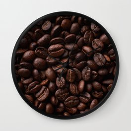 Dark roasted coffee beans arranged as flat background Wall Clock