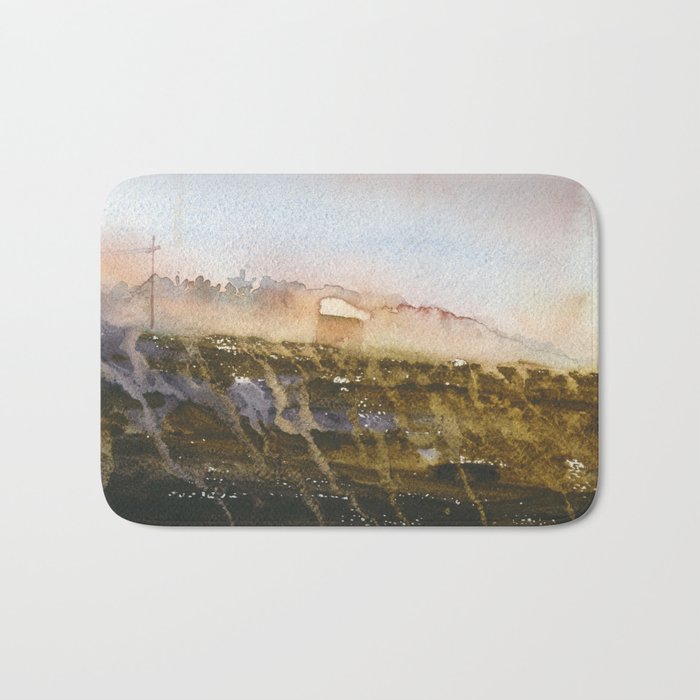 Mist covered landscape painting with buildings. Bath Mat