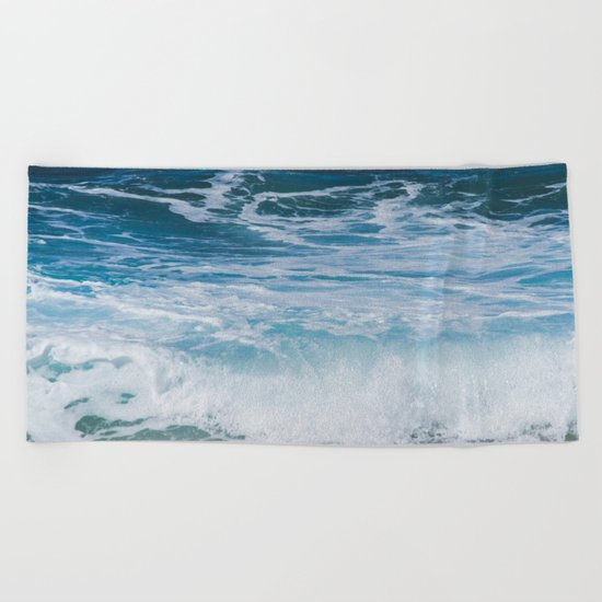 Ocean waves from the depths of the stars Beach Towel