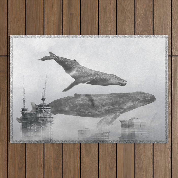 Whale Passing Buildings Outdoor Rug