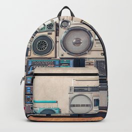 Retro old school design ghetto blaster stereo radio cassette tape recorders boombox tower from circa 1980s front concrete wall background. Vintage style filtered photo Backpack