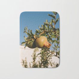 Green pomegranate, red fruit at the market in Ostuni, Italy | Colorful travel food photography art print Bath Mat