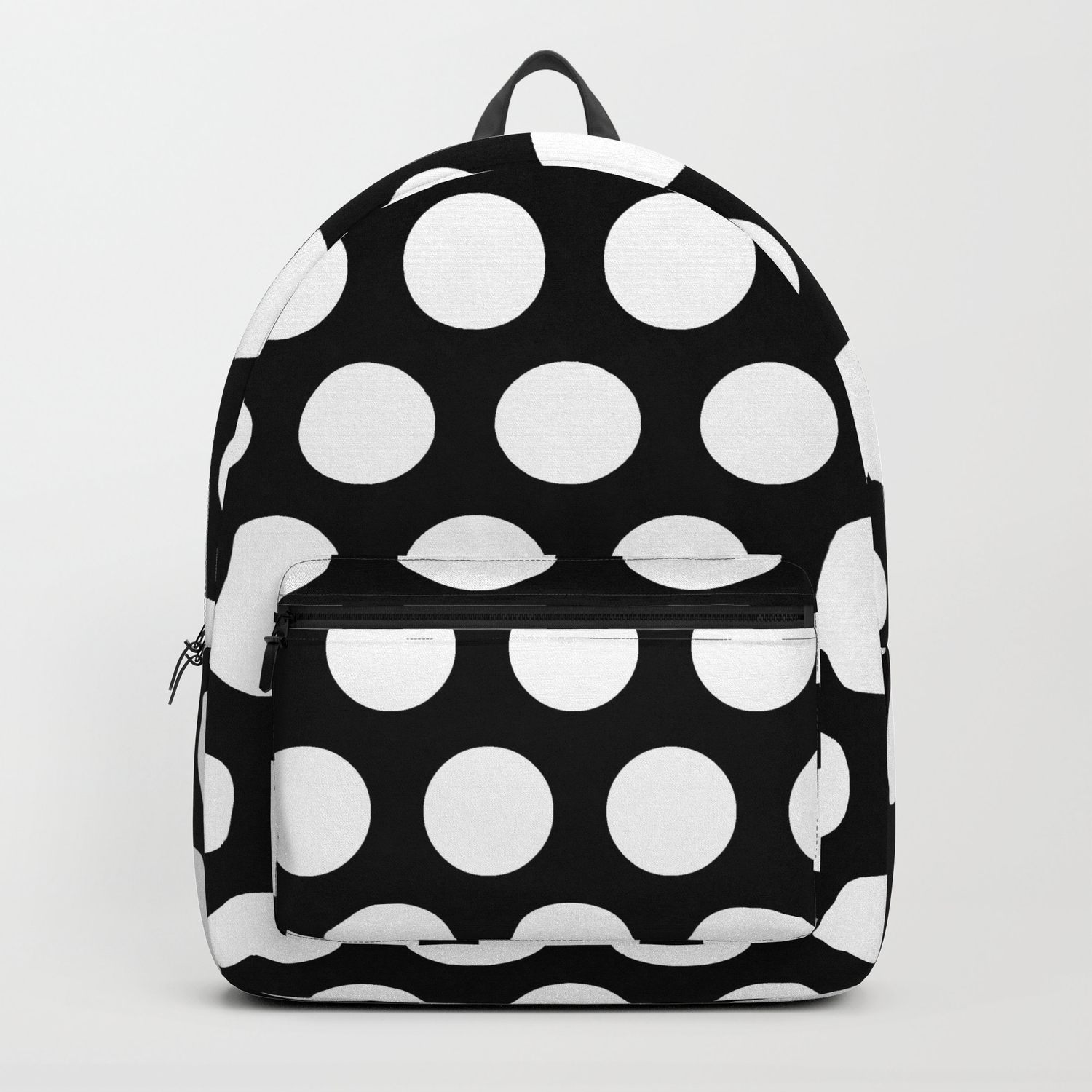 black polka dot backpack