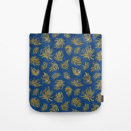 Gold leaves on dark texture background Tote Bag