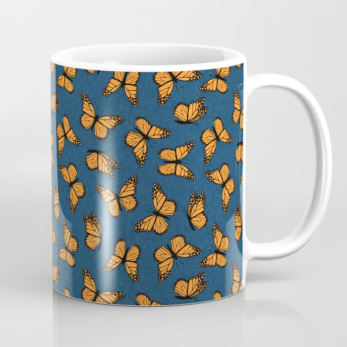 monarch butterflies - orange on dark blue Coffee Mug