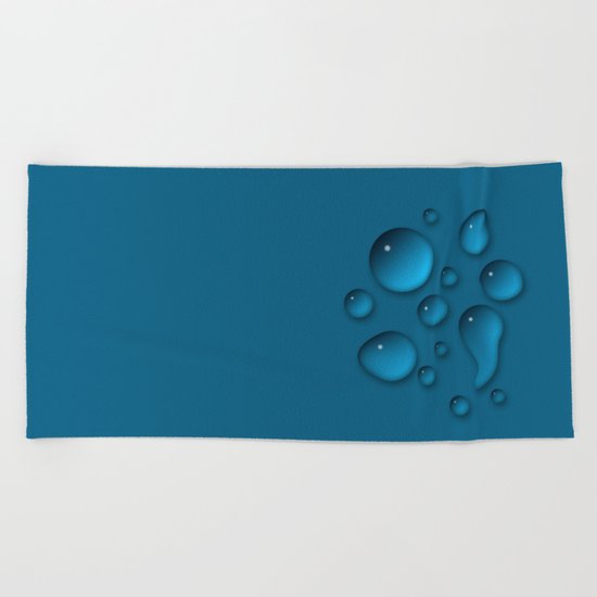 Water drops on a blue background Beach Towel