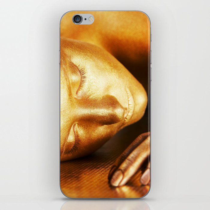Close-up portrait of a gold girl's face (bodypainting art) iPhone Skin