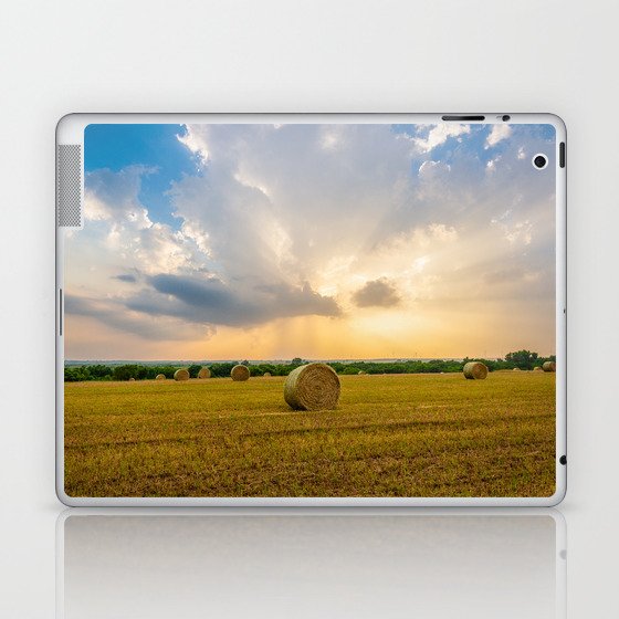 The Best of Times - Round Hay Bales Under a Stormy Sky Filled with Golden Sunlight in Oklahoma Laptop & iPad Skin