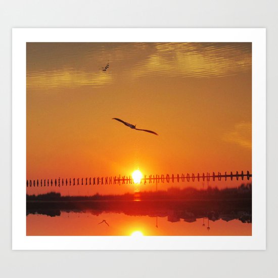 sunset in reverse. - the sea becomes the sky Art Print