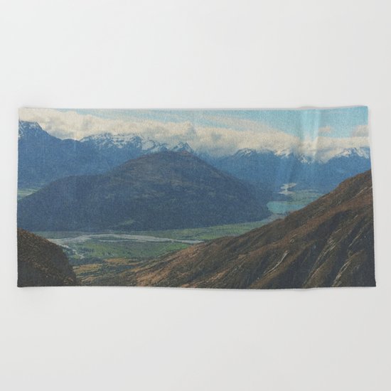 on top of mountain and beneath the stars Beach Towel