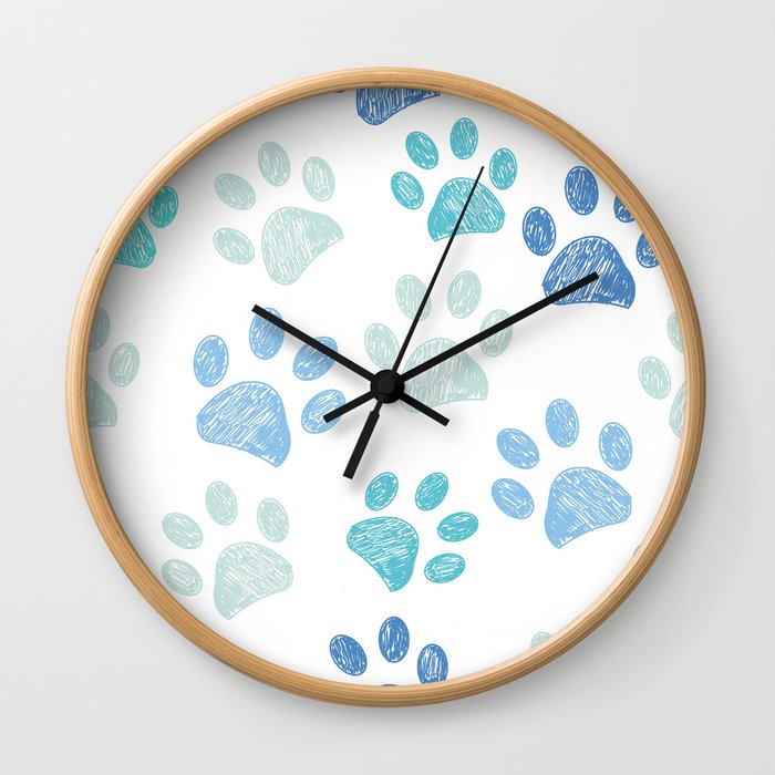 Blue colored paw print background Wall Clock