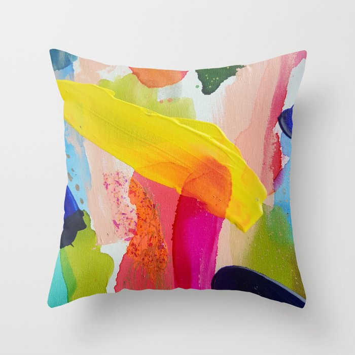 Tiny decorative pillows top