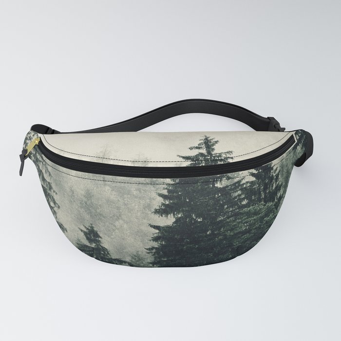 Thick pine forest in the descending mist Fanny Pack