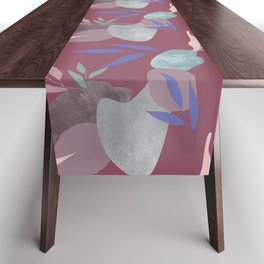 modern colorful leaves and stones on maroon wine Table Runner