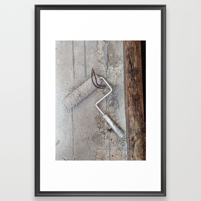 White on white paint roll with wooden piles Framed Art Print
