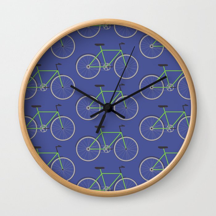 Green bikes on blue Wall Clock