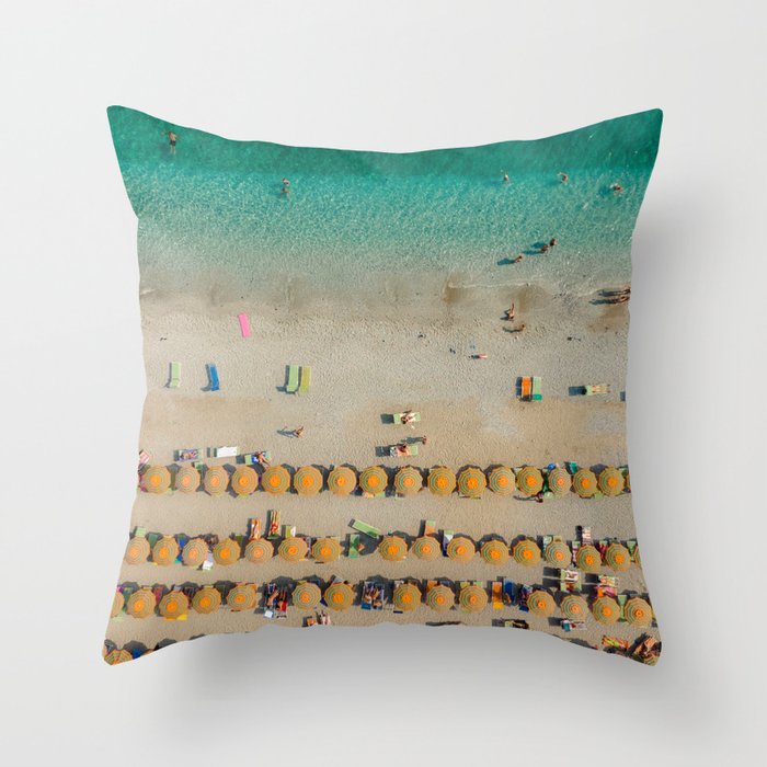 Colorful umbrellas at a beach in the Cinque Terre, Italy Throw Pillow