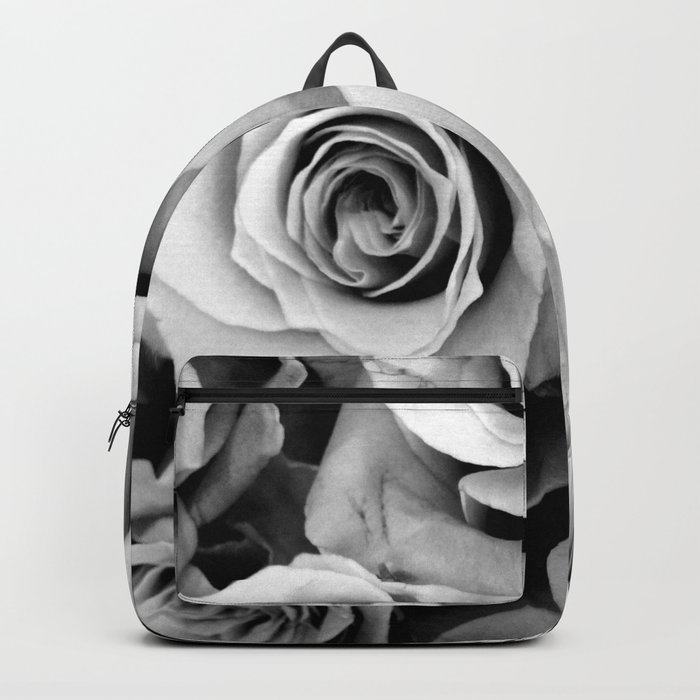 black backpack with roses