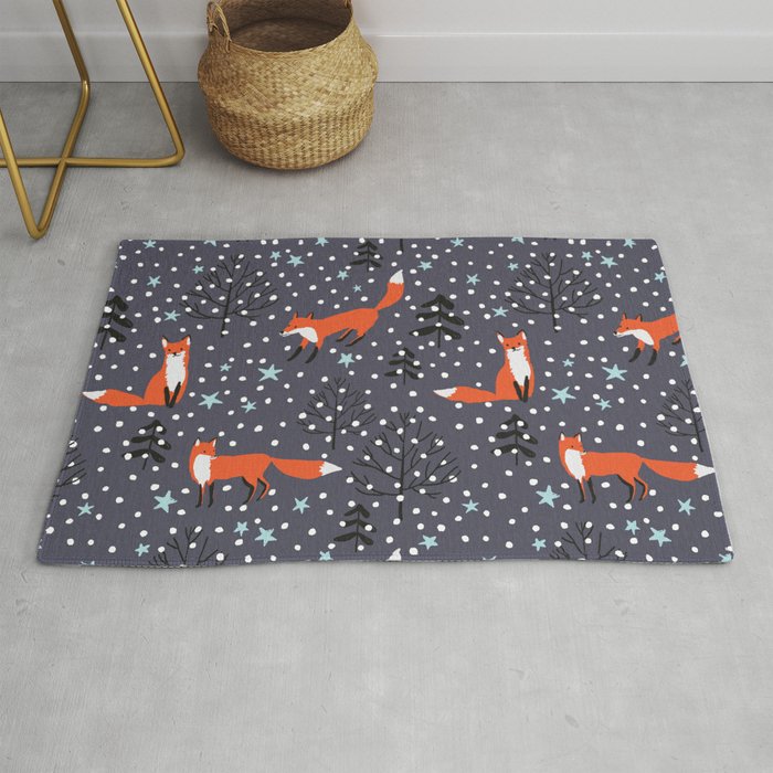 Red foxes in the nignt winter forest Rug