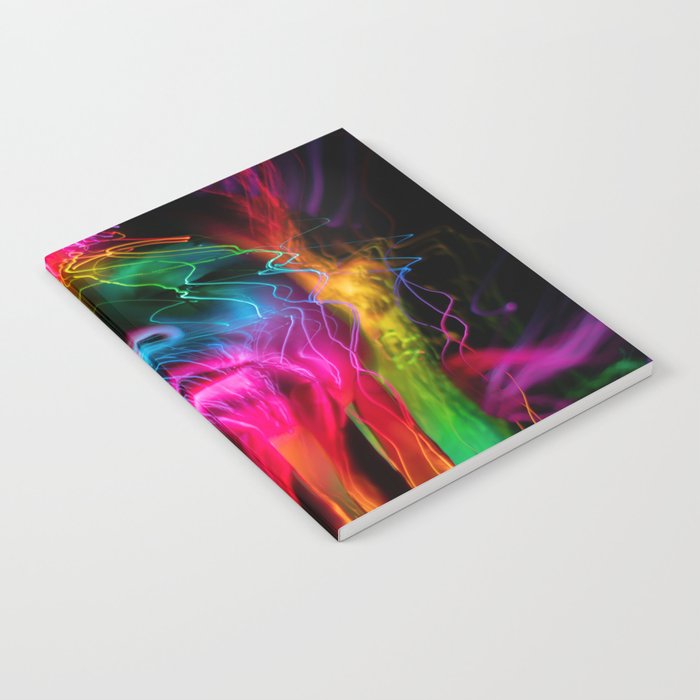 A Colorful Face Glowing Notebook