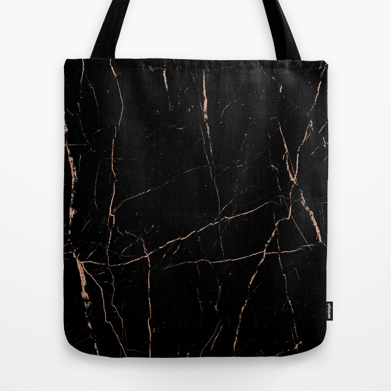 black and rose gold handbag
