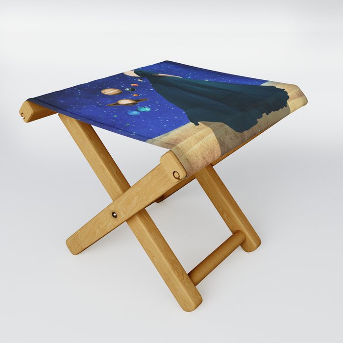 A woman with planets Folding Stool