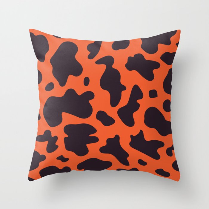orange cow print Throw Pillow