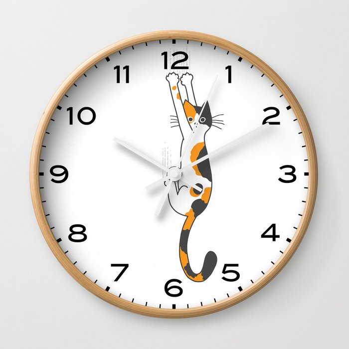 Calico Cat Hanging On Wall Clock