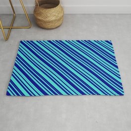 [ Thumbnail: Turquoise and Dark Blue Colored Lined/Striped Pattern Rug ]